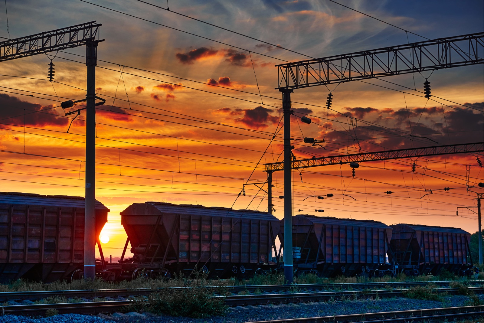 A freight train at sunset